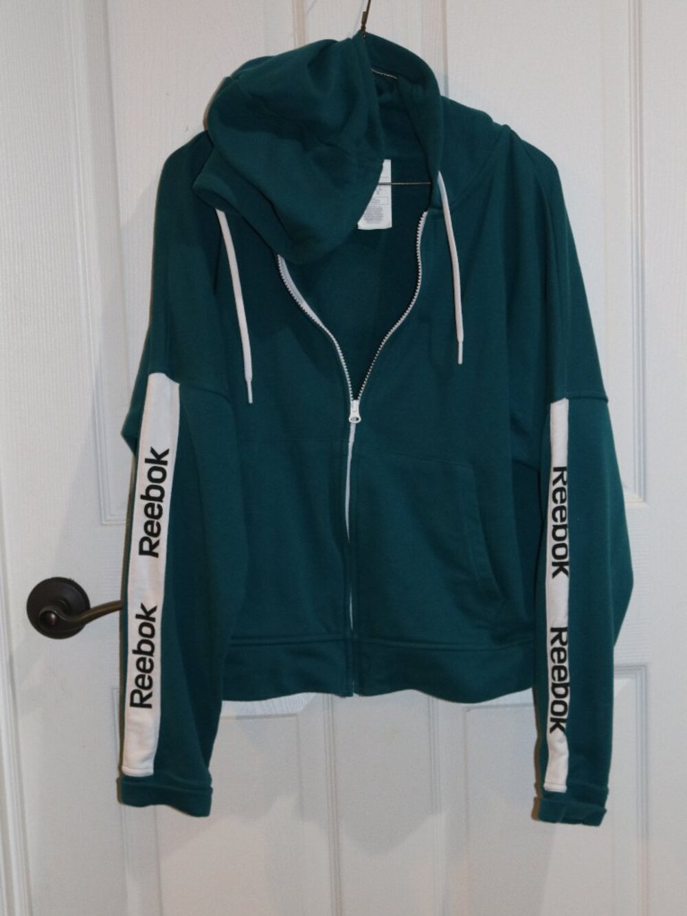 Women's teal and white hooded zip up sweatshirt. New. L.